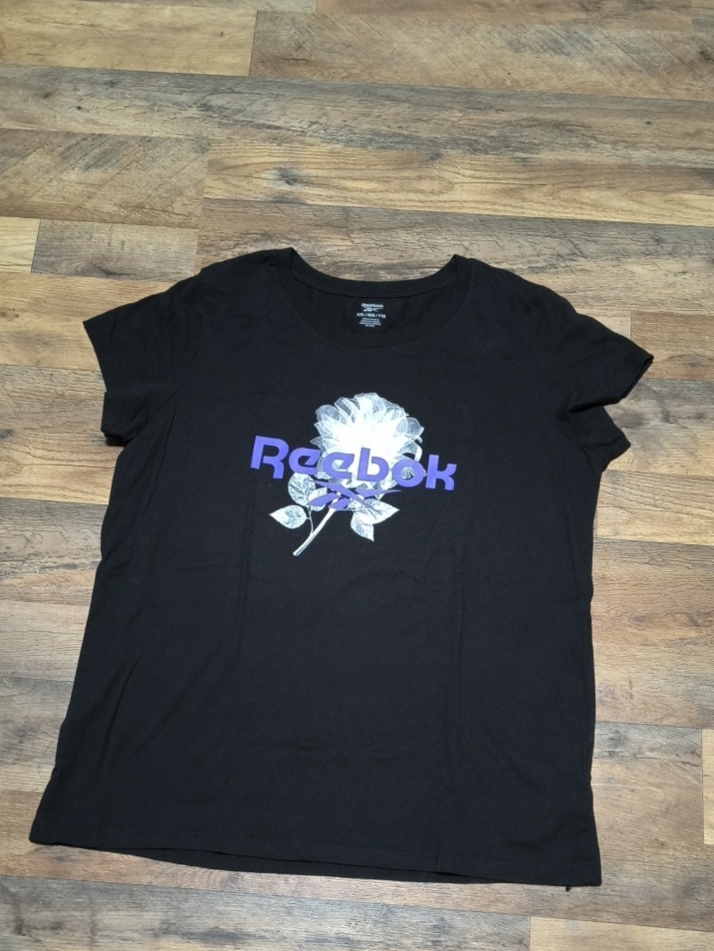 Reebok Black Short Sleeve Tee with Purple Logo and Floral Print